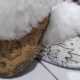 Warm sheepskin slippers with space designs for children.