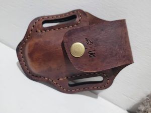 High-quality leather paddle pouch for Leatherman tools.