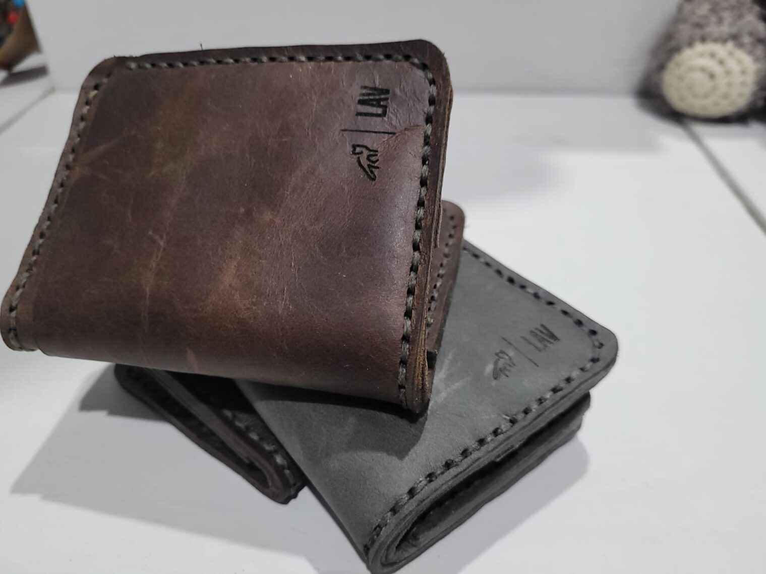 Handcrafted bi-fold card leather wallet made from high-quality leather.