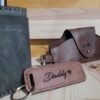 Leather key rings with 'DAD,' 'BEST DAD,' and 'DADDY' engravings.